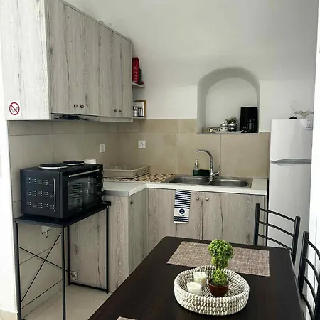 Nikos White Cave In Emporio