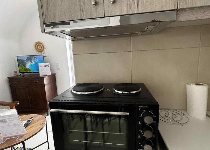 Nikos White Cave In Emporio